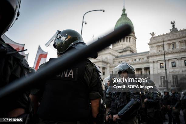 Police officers seen in front of Congress during the demonstration against Javier Milei's proposed Omnibus law. The Omnibus Law of more than 600...
