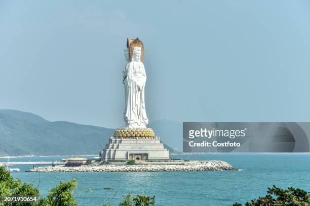 Giant Guanyin statue is seen over the sea at Nanshan Temple in Sanya, Hainan province, China, December 30, 2020. Nanshan Temple covers an area of 400...