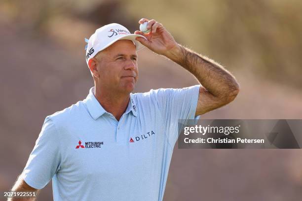 Stewart Cink of the United States reacts to fans on the 18th green after completing the second round of the Cologuard Classic at La Poloma Country...