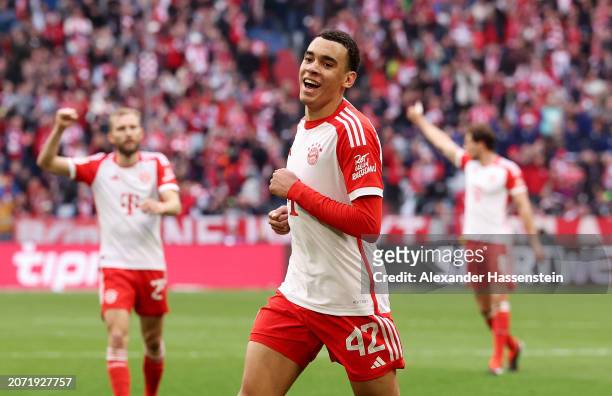 Jamal Musiala of Bayern Munich celebrates scoring his team's fifth goal during the Bundesliga match between FC Bayern München and 1. FSV Mainz 05 at...