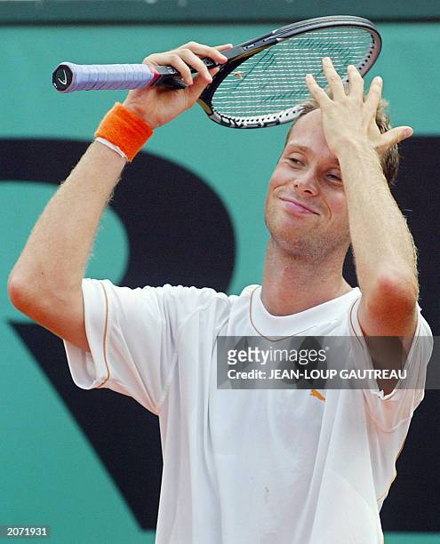 Netherlands' Martin Verkerk reacts, 08 June 2003 in Paris, during the Roland Garros French Tennis Open final match against Spain's Juan Carlos...