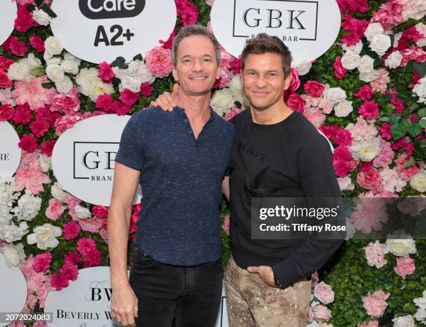 Neil Patrick Harris and David Burtka attend GBK Brand Bar Pre-Oscar luxury lounge at Beverly Wilshire, Presented By CareA2+ at Beverly Wilshire, A...