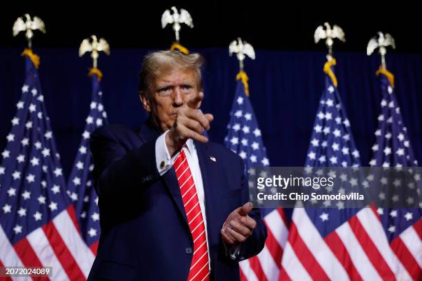 Republican presidential candidate and former U.S. President Donald Trump leaves the stage a the conclusion of a campaign rally at the Forum River...