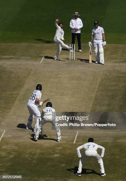 Kuldeep Yadav of India bowls to Joe Root during day three of the 5th Test Match between India and England at Himachal Pradesh Cricket Association...