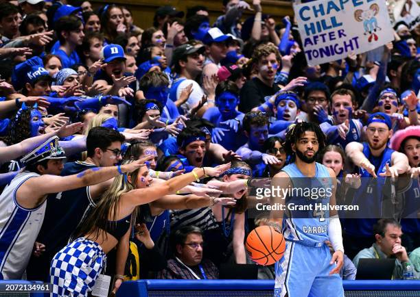 The Cameron Crazies taunt RJ Davis of the North Carolina Tar Heels during the second half of the game against the Duke Blue Devils at Cameron Indoor...