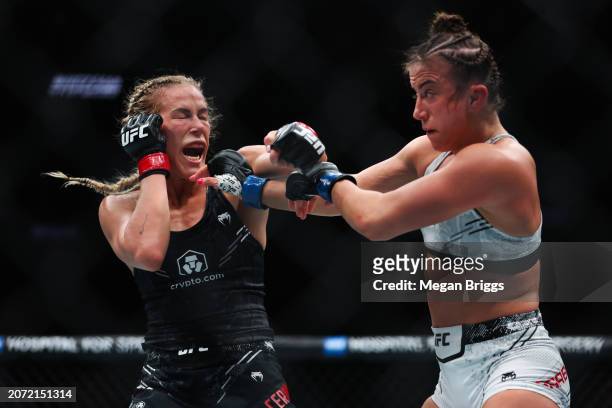 Katlyn Cerminara and Maycee Barber fight during their women's flyweight bout at UFC 299 at Kaseya Center on March 09, 2024 in Miami, Florida.