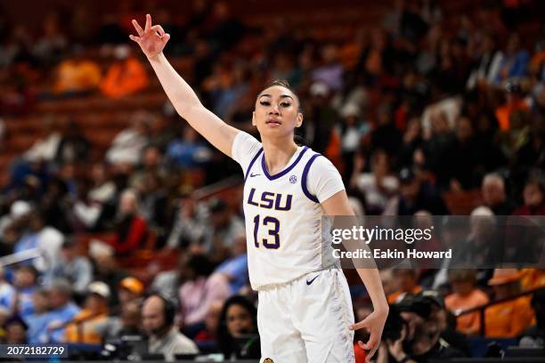 Last-Tear Poa of the LSU Lady Tigers celebrates a three point basket against the Ole Miss Rebels in the third quarter during the semifinals of the...