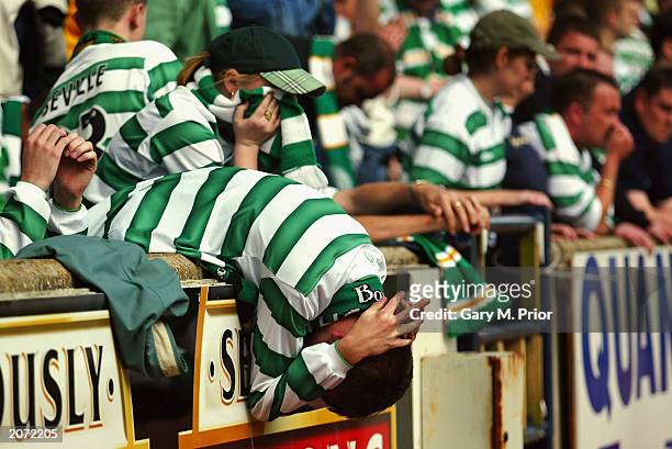 Despair for Celtic fans after Alan Thompson's penalty miss which would prove costly in the race for the championship during the Bank of Scotland...