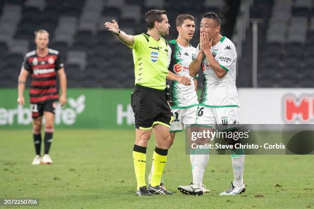 Tomoki Imai of Western United reacts to receiving a yellow card from referee Ben Abraham during the A-League Men round 20 match between Western...