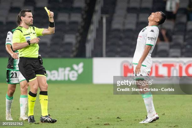 Tomoki Imai of Western United reacts to receiving a yellow card from referee Ben Abraham during the A-League Men round 20 match between Western...