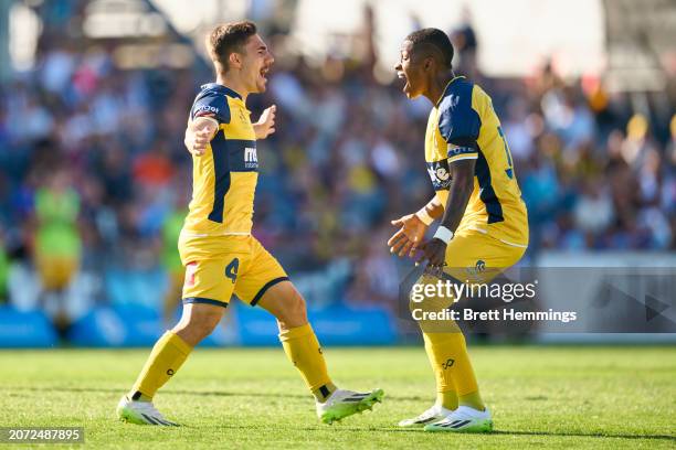 Joshua Nisbet of the Mariners celebrates scoring a goal with team mates during the A-League Men round 20 match between Macarthur FC and Central Coast...