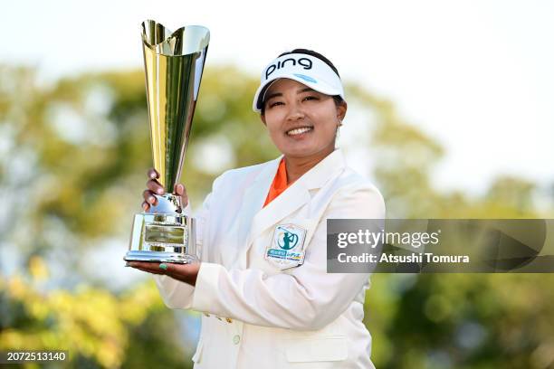 Ai Suzuki of Japan poses with the trophy after winning the tournament following the final round of MEIJI YASUDA LIFE INSURANCE LADIES YOKOHAMA TIRE...