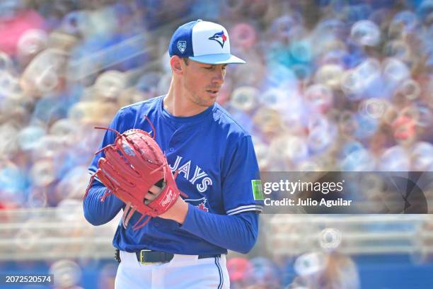 Chris Bassitt of the Toronto Blue Jays prepares to deliver a pitch to the New York Yankees in the second inning during a 2024 Grapefruit League...