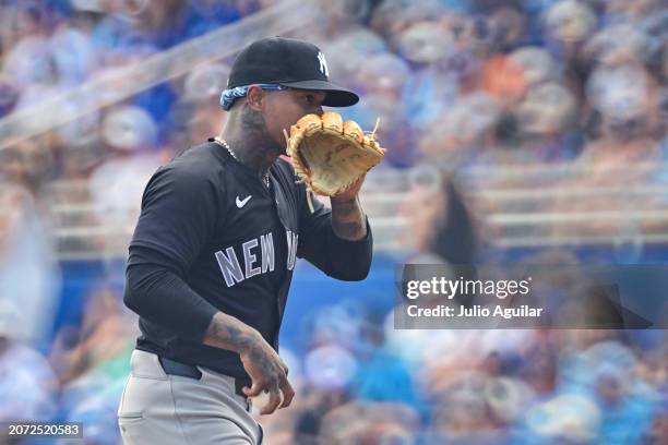 Marcus Stroman of the New York Yankees prepares to deliver a pitch to the Toronto Blue Jays in the first inning during a 2024 Grapefruit League...