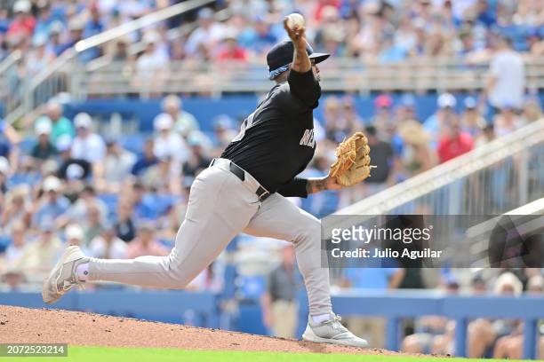 Marcus Stroman of the New York Yankees delivers a pitch to the Toronto Blue Jays in the fourth inning during a 2024 Grapefruit League Spring Training...