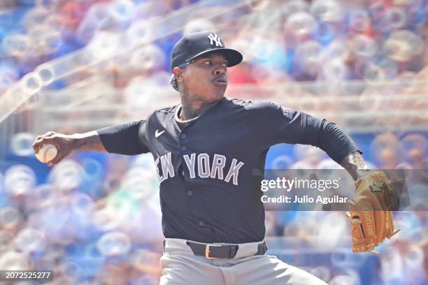 Marcus Stroman of the New York Yankees delivers a pitch to the Toronto Blue Jays in the second inning during a 2024 Grapefruit League Spring Training...