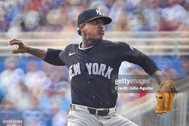 Marcus Stroman of the New York Yankees delivers a pitch to the Toronto Blue Jays in the second inning during a 2024 Grapefruit League Spring Training...