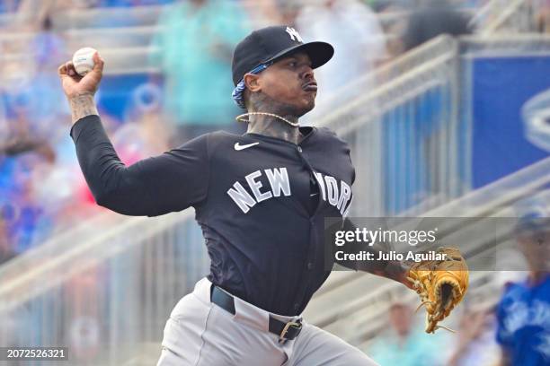 Marcus Stroman of the New York Yankees delivers a pitch to the Toronto Blue Jays in the first inning during a 2024 Grapefruit League Spring Training...