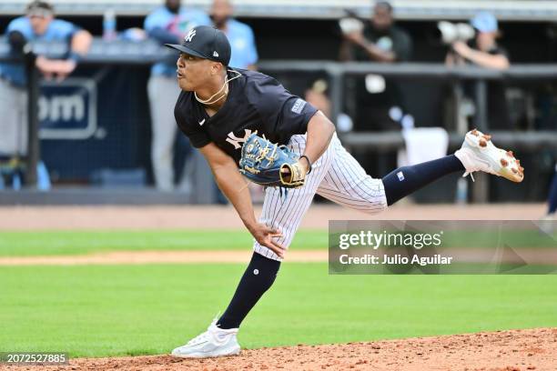 Luis Velasquez of the New York Yankees delivers a pitch to the Tampa Bay Rays in the fourth inning during a 2024 Grapefruit League Spring Training...