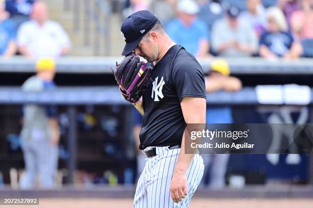 Carlos Rodon of the New York Yankees walks off the field after being relieved in the fourth inning against the Tampa Bay Rays during a 2024...