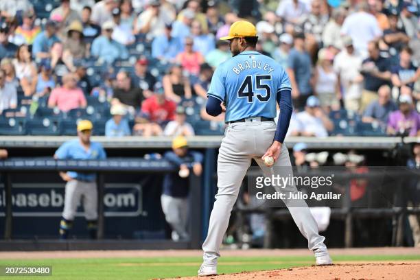 Taj Bradley of the Tampa Bay Rays prepares to deliver a pitch to the New York Yankees in the first inning during a 2024 Grapefruit League Spring...