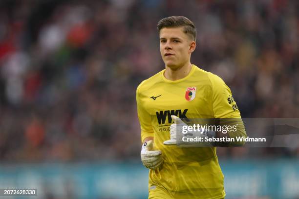 Finn Dahmen of FC Augsburg looks on during the Bundesliga match between FC Augsburg and 1. FC Heidenheim 1846 at WWK-Arena on March 09, 2024 in...