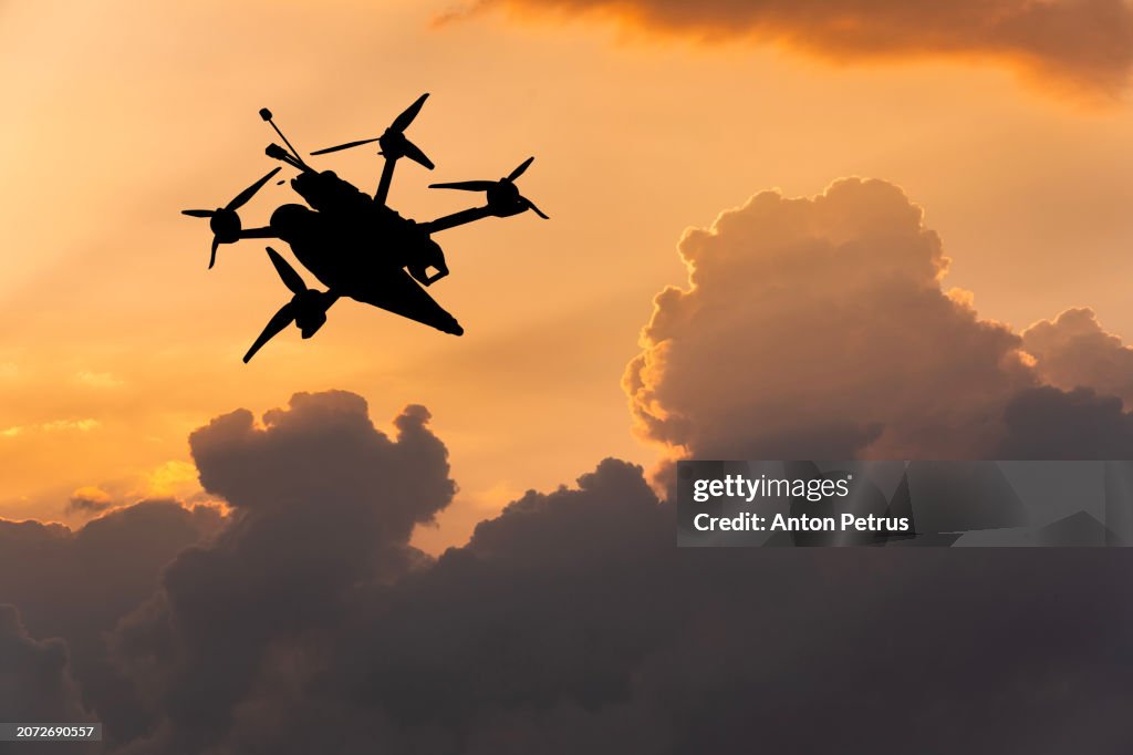 FPV kamikaze drone at sky. Drones at war