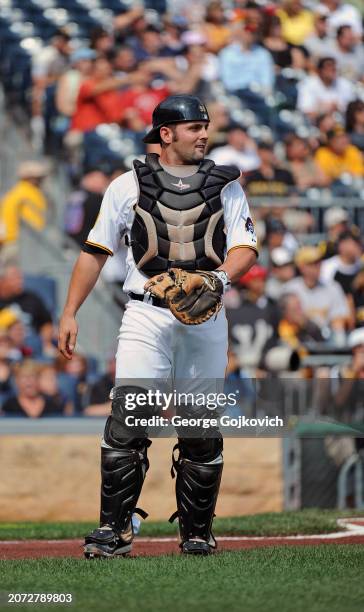 Catcher Michael McKenry of the Pittsburgh Pirates looks on from the field during a game against the Cincinnati Reds at PNC Park on September 25, 2011...