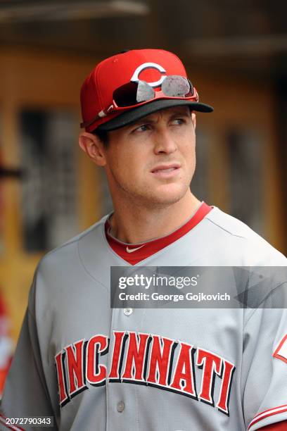 Drew Stubbs of the Cincinnati Reds looks on from the dugout before a game against the Pittsburgh Pirates at PNC Park on September 25, 2011 in...