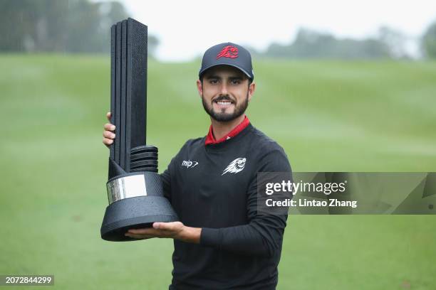 Abraham Ancer of FIREBALLS GC celebrates with the trophy after win the first place during day three of the LIV Golf Invitational - Hong Kong at The...