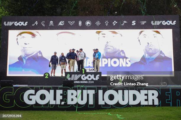 Bryson DeChambeau, Paul Casey, Anirban Lahiri and Charles Howell III of CRUSHERS GC poses with the team trophy after winning the team championship on...