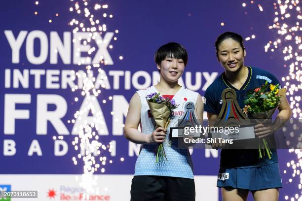 An Se Young of Korea and Akane Yamaguchi of Japan pose with their trophies on the podium after the Women's Singles Final match during day six of the...