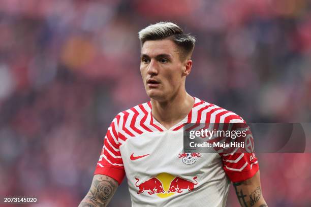 Benjamin Sesko of RB Leipzig looks on during the Bundesliga match between RB Leipzig and SV Darmstadt 98 at Red Bull Arena on March 09, 2024 in...