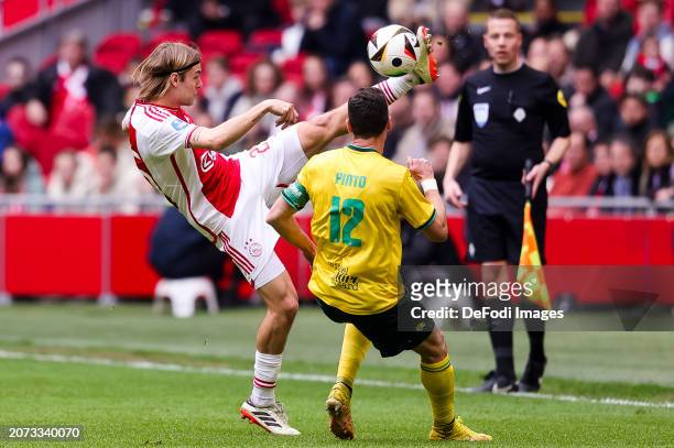 Borna Sosa of AFC Ajax and Ivo Pinto of Fortuna Sittard battle for the ball during the Dutch Eredivisie match between AFC Ajax and Fortuna Sittard at...