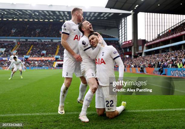 Brennan Johnson of Tottenham Hotspur celebrates scoring his team's second goal with teammate James Maddison during the Premier League match between...