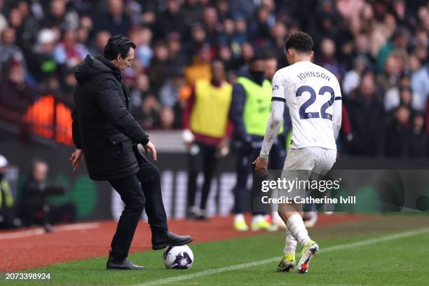 Unai Emery, Manager of Aston Villa, kicks the ball away from Brennan Johnson of Tottenham Hotspur during the Premier League match between Aston Villa...
