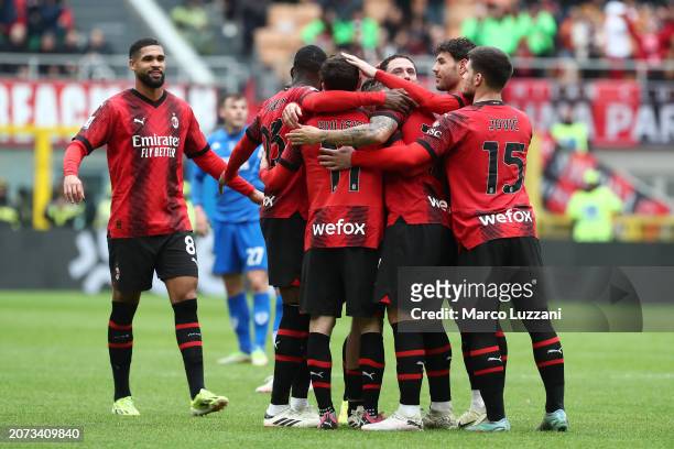 Christian Pulisic of AC Milan celebrates with teammates after scoring his team's first goal during the Serie A TIM match between AC Milan and Empoli...