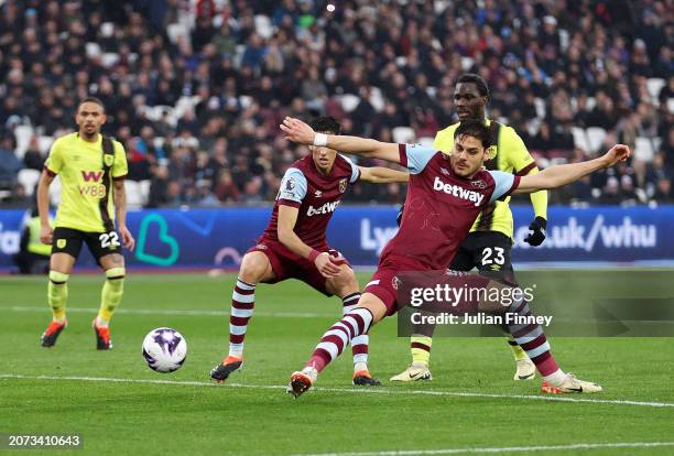 Konstantinos Mavropanos of West Ham United scores an own-goal and Burnley's second goal during the Premier League match between West Ham United and...