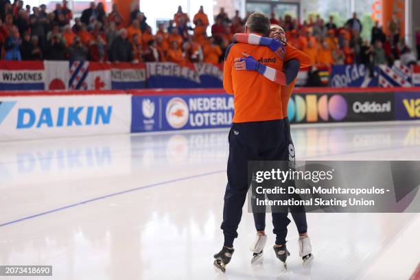 Joy Beune of Netherlands celebrates with her coach after she wins the 5000m Women AllRound race during the ISU World Speed Skating Allround and...