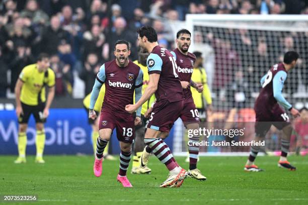 Danny Ings of West Ham United celebrates scoring his team's second goal during the Premier League match between West Ham United and Burnley FC at the...