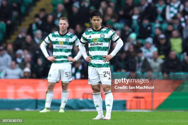 Tomoki Iwata of Celtic looks dejected after Tete Yengi of Livingston scores his team's second goal during the Scottish Cup Quarter Final match...