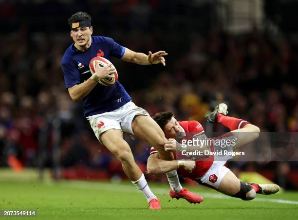 Nicolas Depoortere of France is tackled by Josh Adams of Wales during the Guinness Six Nations 2024 match between Wales and France at the...