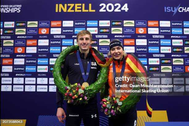 Jordan Stolz of USA for the Men and Joy Beune of Netherlands for the Women pose after winning the AllRound Championship during the ISU World Speed...