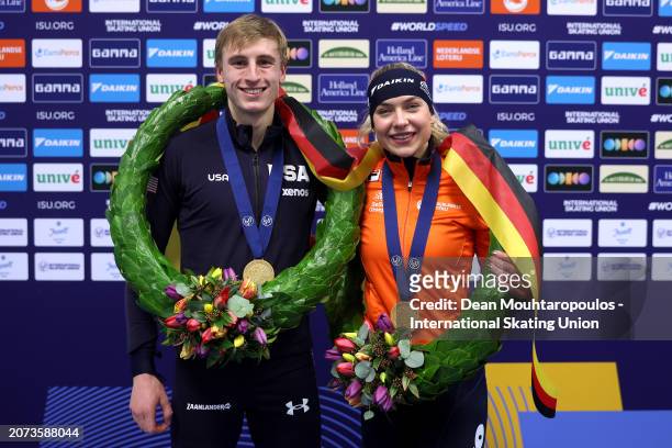 Jordan Stolz of USA for the Men and Joy Beune of Netherlands for the Women pose after winning the AllRound Championship during the ISU World Speed...