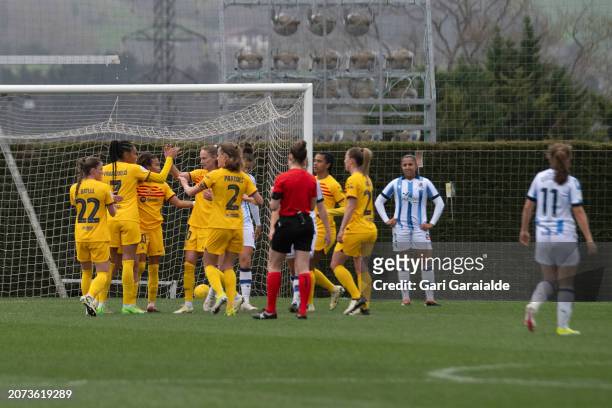Players of FC Barcelona celebrate scoring their team's second goa during the Primera Division Femenina match between Real Sociedad and FC Barcelona...