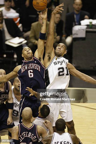 Kenyon Martin of the New Jersey Nets and Tim Duncan of the San Antonio Spurs go for the tip-off during Game two of the 2003 NBA Finals at SBC Center...