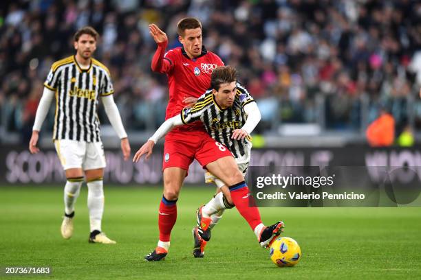 Fabio Miretti of Juventus is challenged by Mario Pasalic of Atalanta BC during the Serie A TIM match between Juventus and Atalanta BC - Serie A TIM...