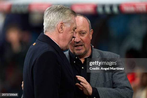 Head coach Carlo Ancelotti of Real Madrid interacts with Head coach Rafa Benitez of RC Celta prior to the LaLiga EA Sports match between Real Madrid...