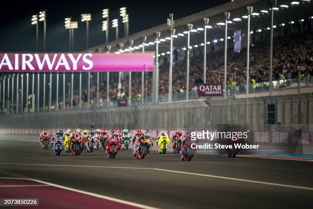 MotoGP race start - Francesco Bagnaia of Italy and Ducati Lenovo Team rides next to Jorge Martin of Spain and Prima Pramac Racing during the Race of...