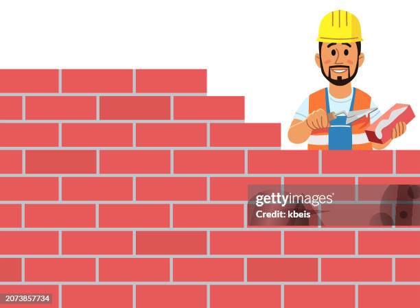 glücklicher maurer, der eine mauer baut - steinmetz stock-grafiken, -clipart, -cartoons und -symbole